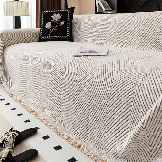 LumiWeave – Sofaschoner-Plaid im Fischgrätmuster
