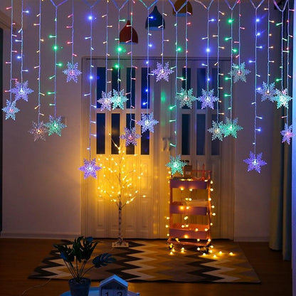 SnowGlow™ | LED Vorhang-Lichterkette mit Schneeflockenmotiv