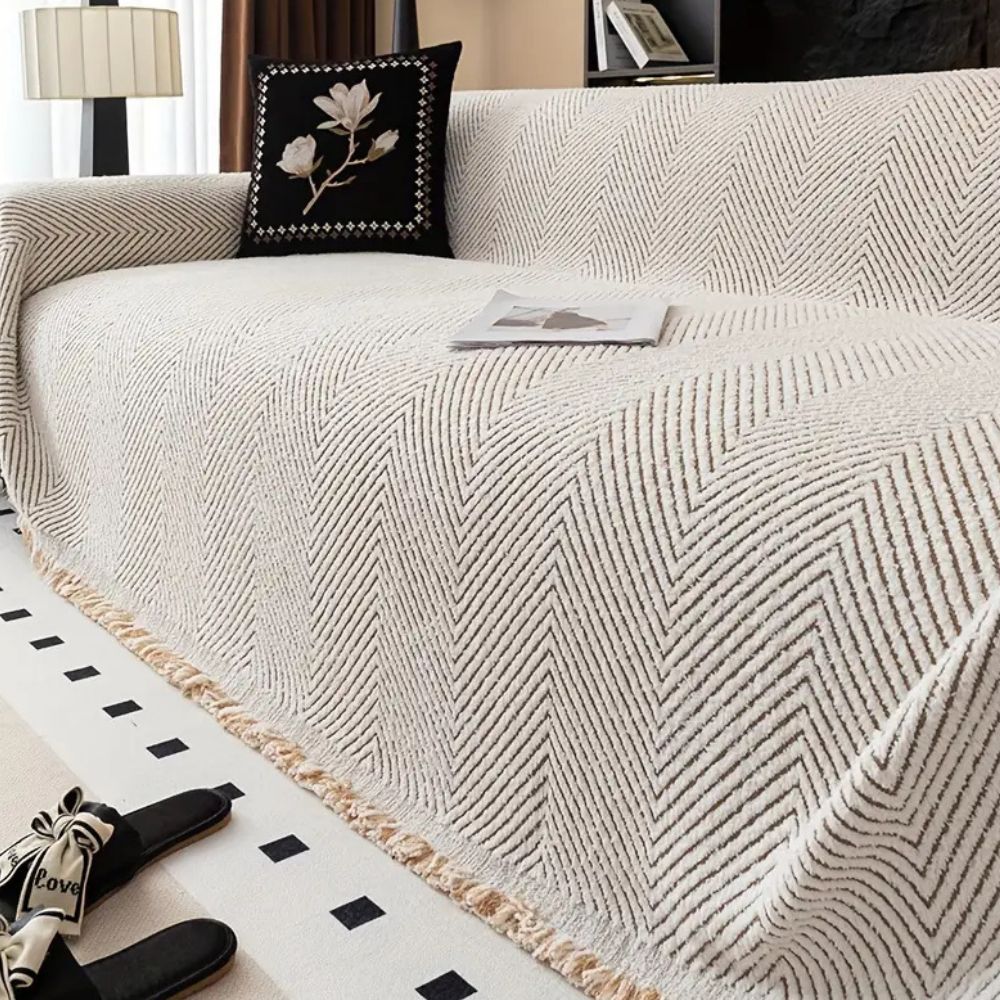 LumiWeave – Sofaschoner-Plaid im Fischgrätmuster