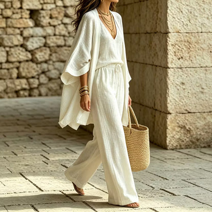Elegantes Dreiteiler-Set bestehend aus Dreiviertelarm-Cardigan, ärmelloser Weste und Hose