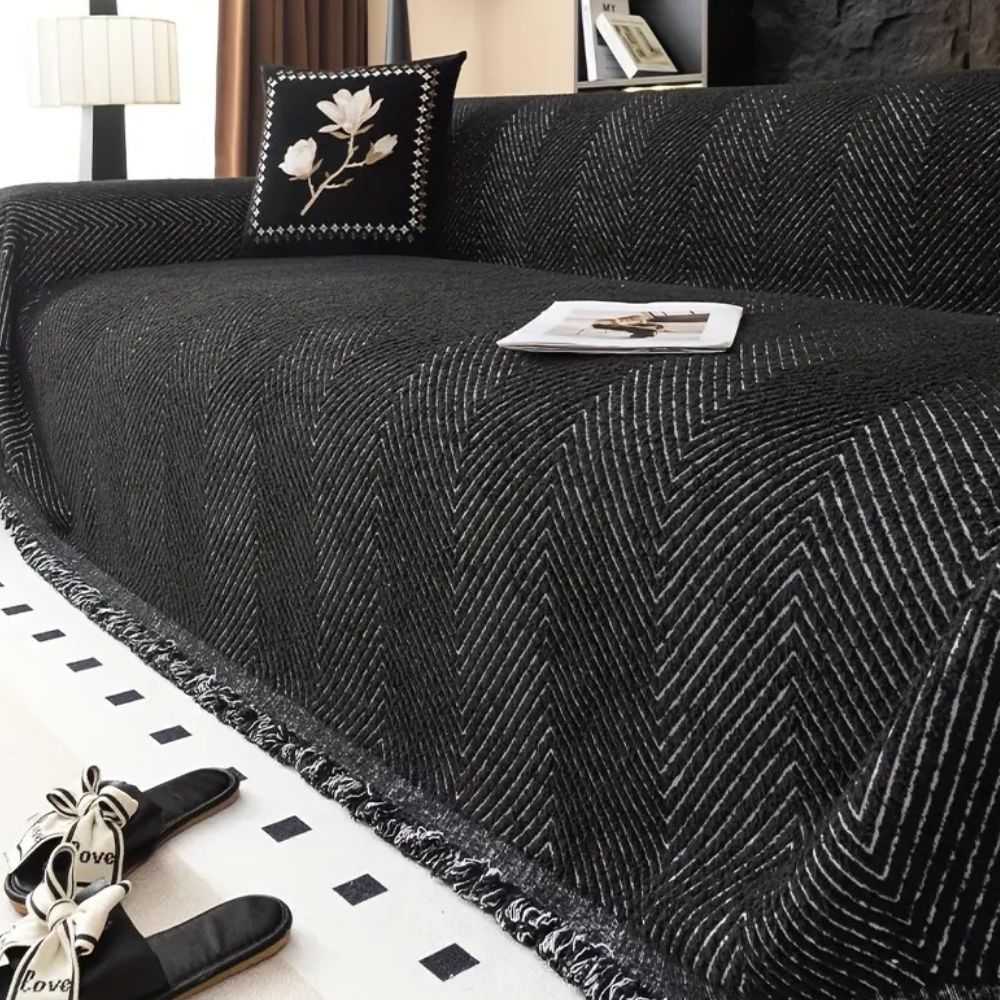 LumiWeave – Sofaschoner-Plaid im Fischgrätmuster